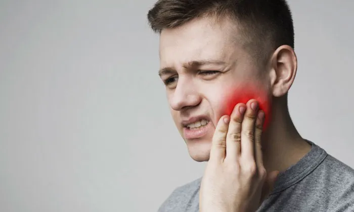 Triệu chứng, nguyên nhân và cách chăm sóc đau xương hàm gần tai